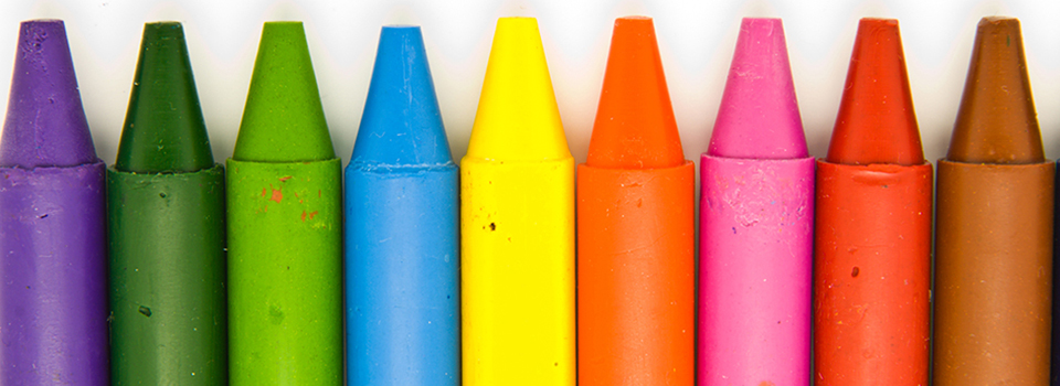 many different colored crayons arranged next to each other